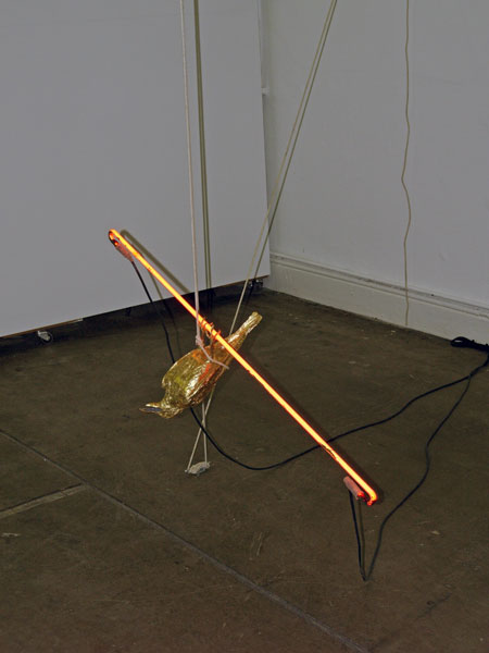 Niamh McCann: The Golden Calf, 2010, rope, pulleys, gilded bronze, found neon; courtesy Cake