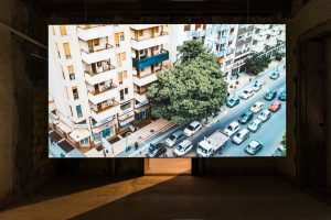 URIEL ORLOW, Wishing Trees, 2018, Video installation, documents and artefacts in vitrines, photography. Dimensions variable. Photo: Simone Sapienza, courtesy of Manifesta 12 Palermo and the artist.